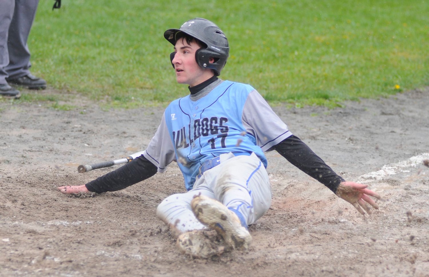 Solo score. In the third inning, Sullivan West’s Andrew Hubert slides home for the Bulldog’s only score in the game.